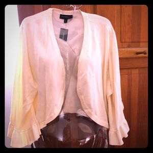 Lane Bryant off white ruffled shrug size 26/28